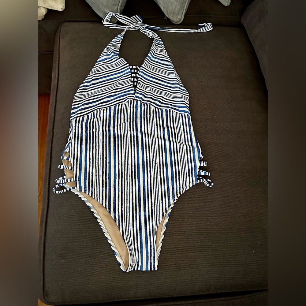 One piece swimsuit.